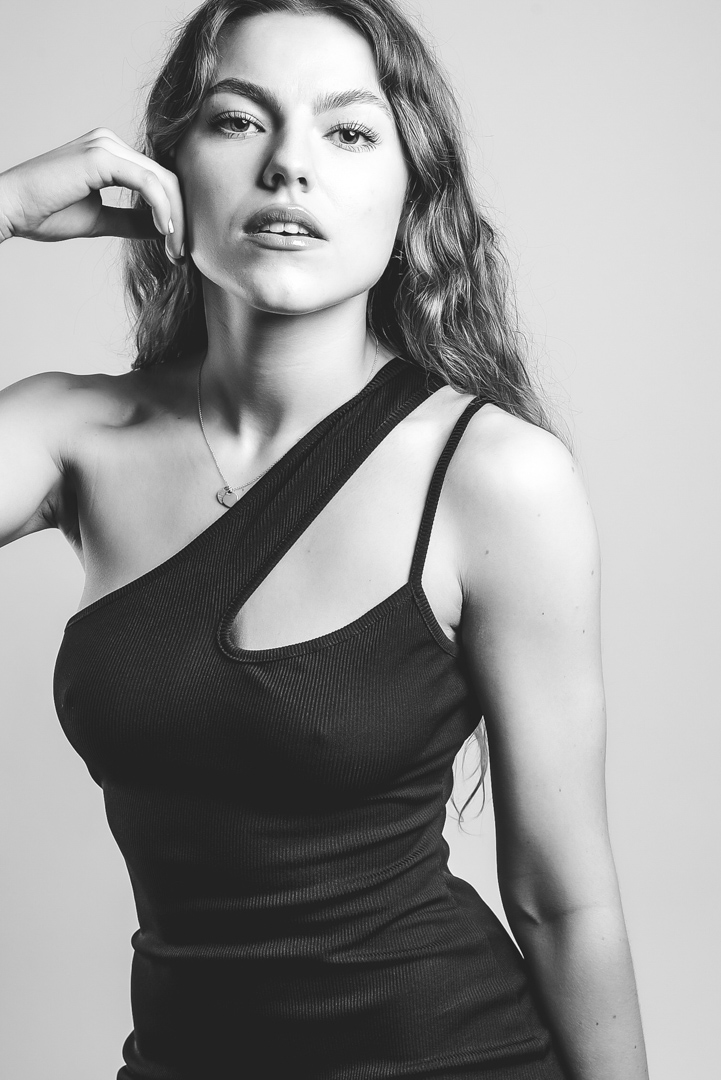 Stunning Model shot in a studio, black and white.