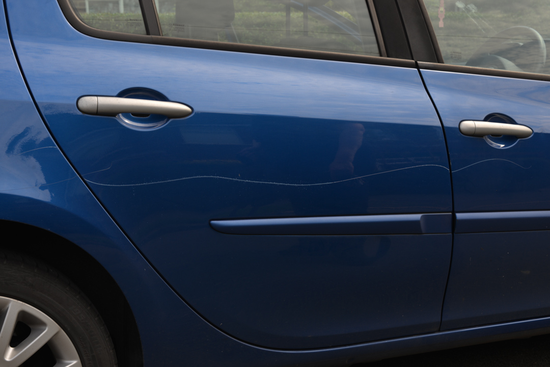 image dump My mothers scratched car, keyed by her neighbour. 
